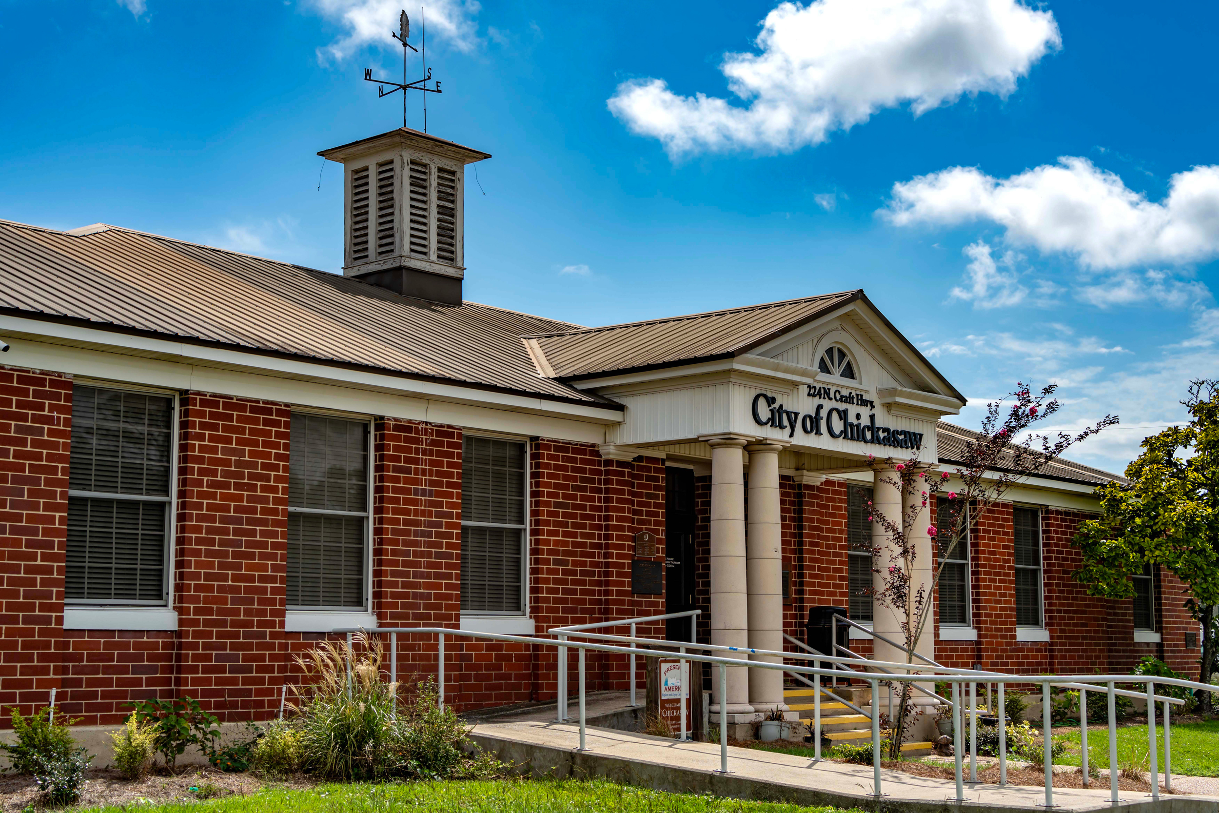 A view of Chickasaw's city complex, topped with a Chieftain weather vane. Credit: Lee Hedgepeth/Inside Climate News