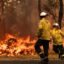 Rural Fire Service firefighters are seen by containment lines at the Three Mile Fire during “Black Summer” on the Central Coast of Australia in December 2019. Studies have examined the psychological impacts of the unprecedented bushfire season. Credit: Sam Mooy/Getty Images