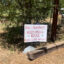 Outside a home in Arizona’s Pine-Strawberry community, a sign urges others to conserve water and that the water crisis in the district is real. Credit: Wyatt Myskow/Inside Climate News