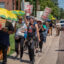 Activists in Pueblo, Colorado, march during a utility justice action organized by Mothers Out Front and 350 Colorado. Credit: Mothers Out Front